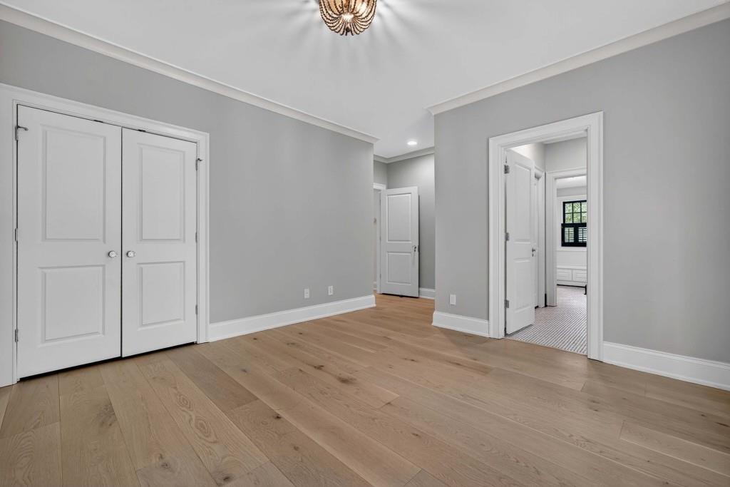 3303 Habersham Road Northwest Atlanta, GA 30305 - Photo 40 of 63 a view of an empty room with a ceiling fan
