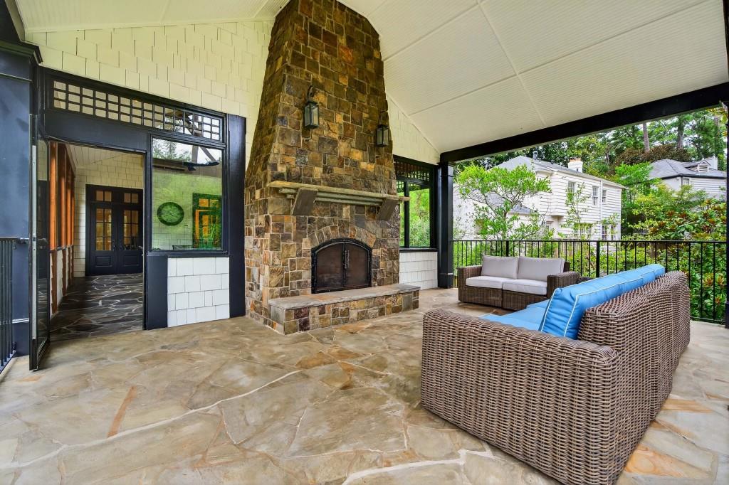 3303 Habersham Road Northwest Atlanta, GA 30305 - Photo 52 of 63 a outdoor living space with patio furniture and a fireplace
