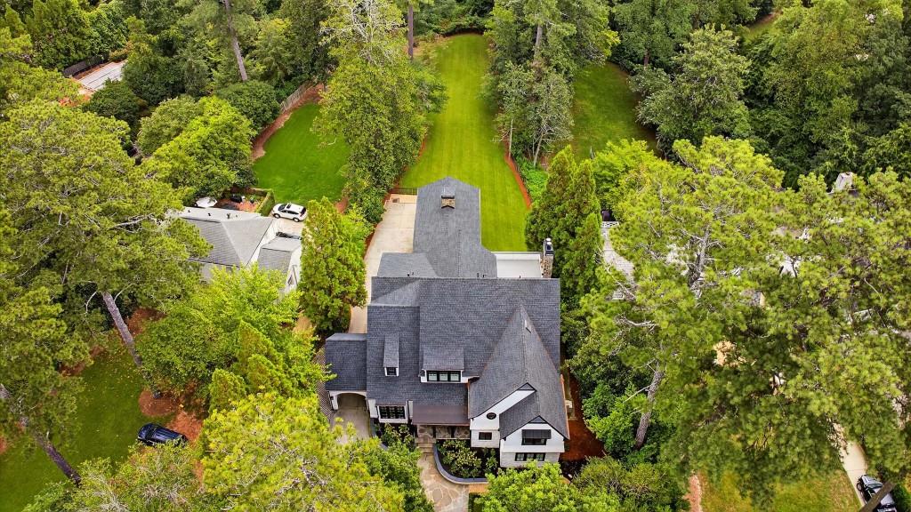 3303 Habersham Road Northwest Atlanta, GA 30305 - Photo 62 of 63 an aerial view of residential house with outdoor space and trees all around