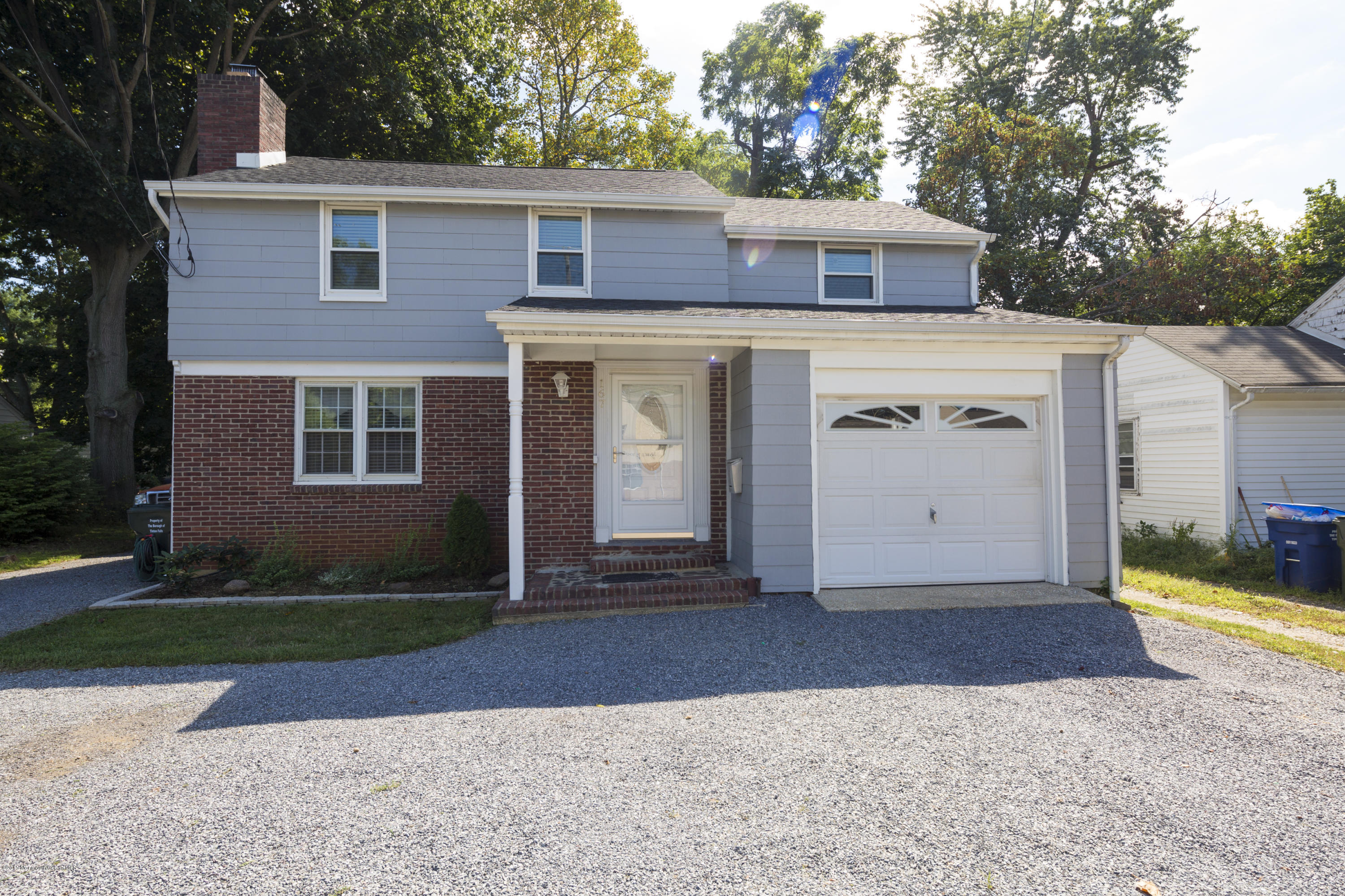 167 Newman Springs Road Tinton Falls, NJ 07724 - Photo 1 of 23 a view of a house with a yard