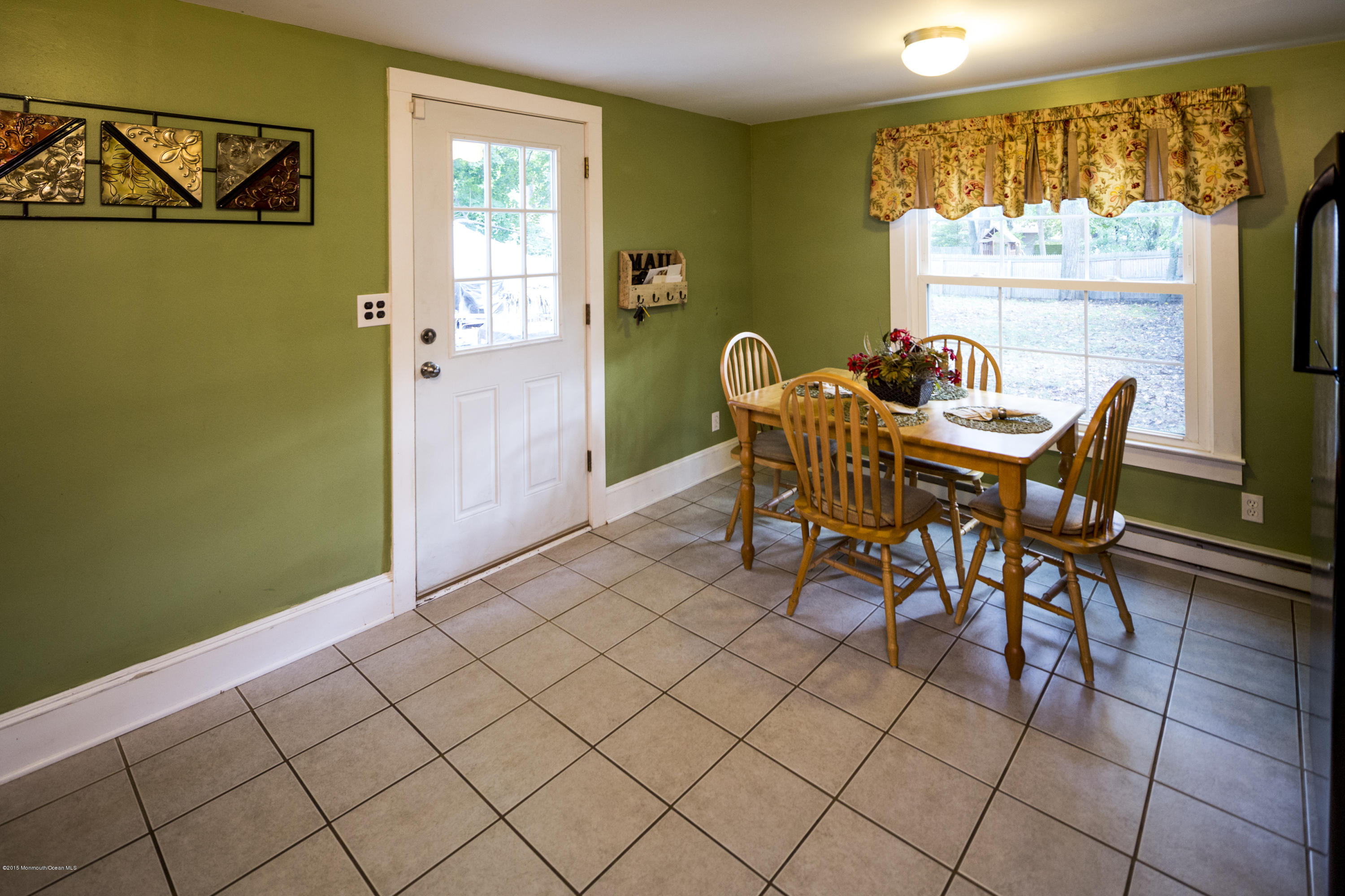 167 Newman Springs Road Tinton Falls, NJ 07724 - Photo 13 of 23 a view of a dining room with furniture window and outside view