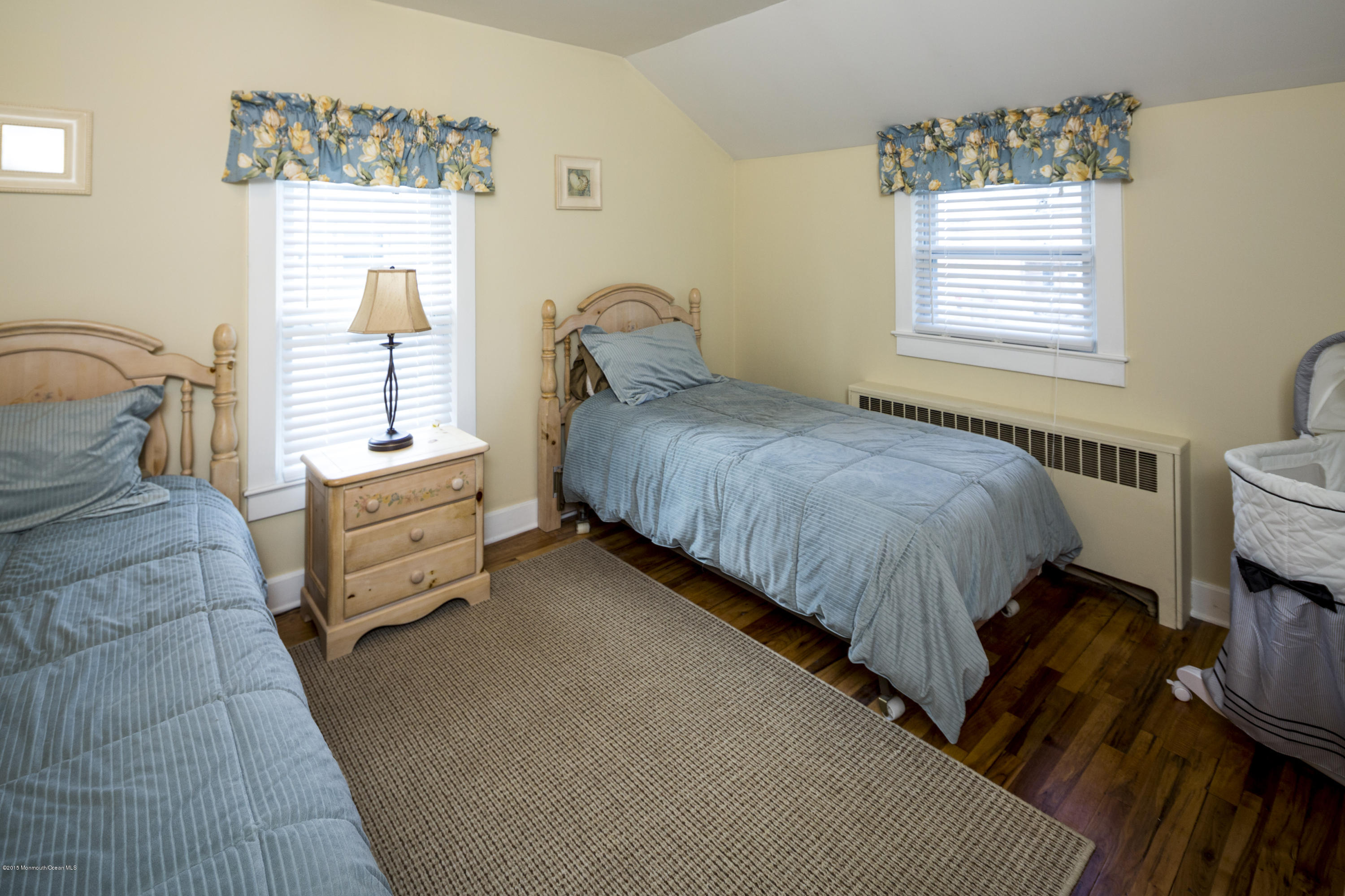 167 Newman Springs Road Tinton Falls, NJ 07724 - Photo 16 of 23 a bedroom with bed and window
