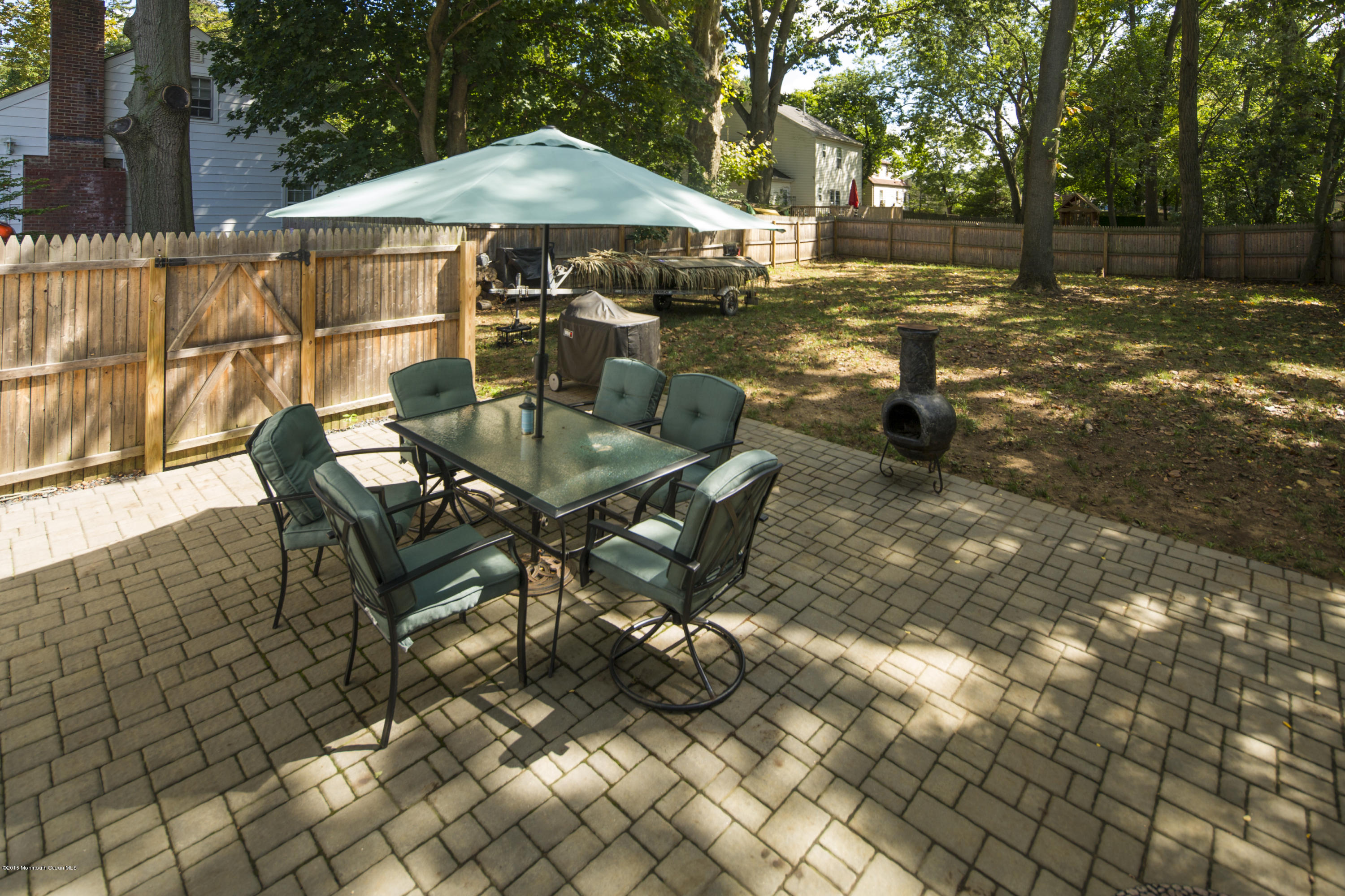 167 Newman Springs Road Tinton Falls, NJ 07724 - Photo 20 of 23 a patio with table and chairs