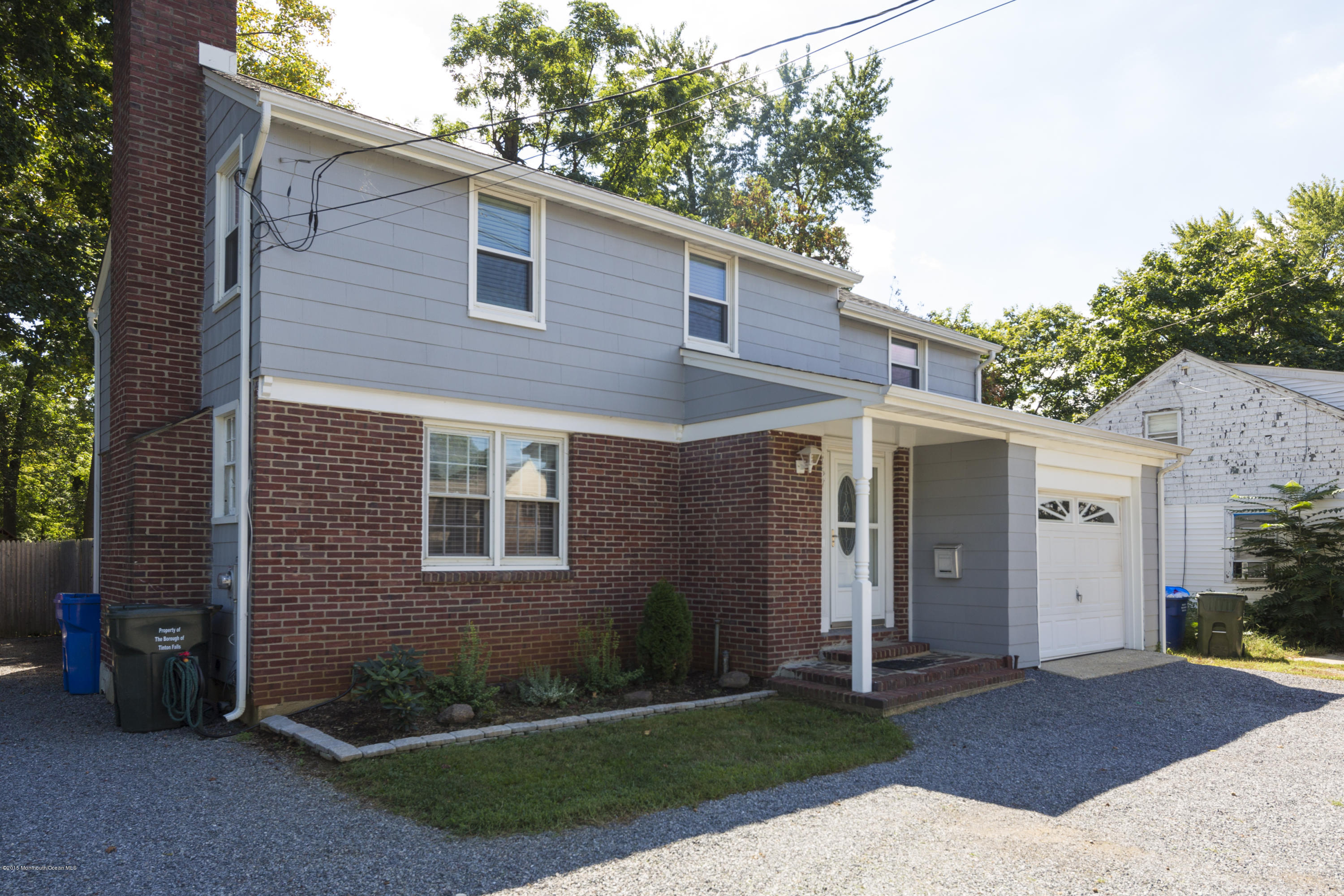 167 Newman Springs Road Tinton Falls, NJ 07724 - Photo 3 of 23 a view of a house with a yard