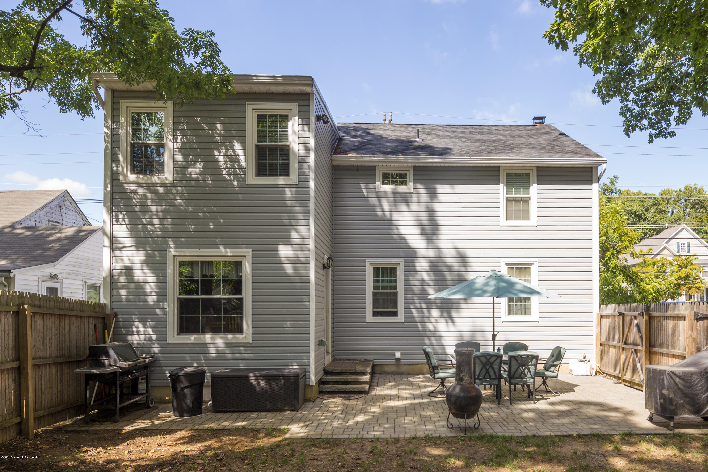 167 Newman Springs Road Tinton Falls, NJ 07724 - Photo 22 of 23 a view of a house with a patio