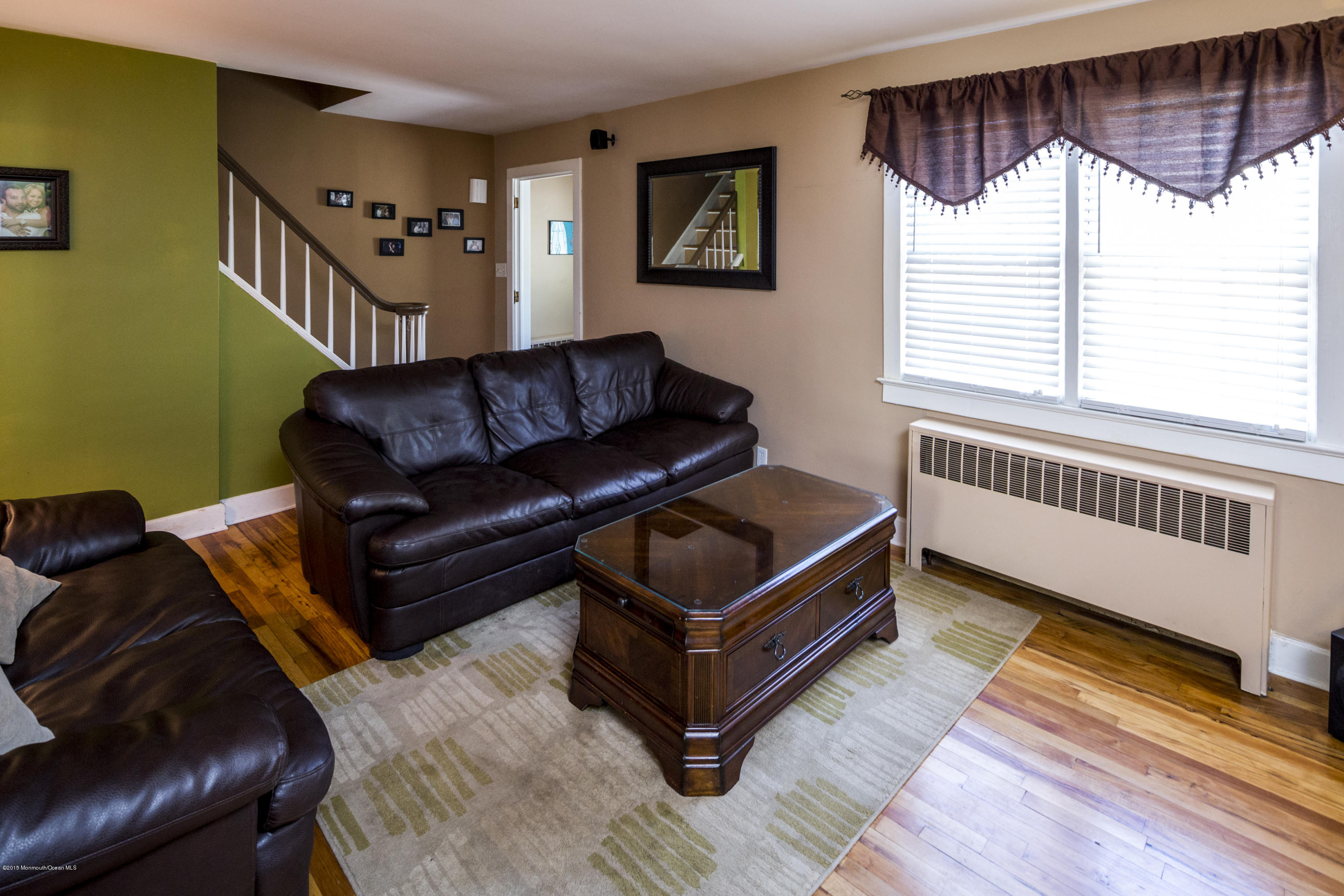 167 Newman Springs Road Tinton Falls, NJ 07724 - Photo 9 of 23 a living room with furniture and a window