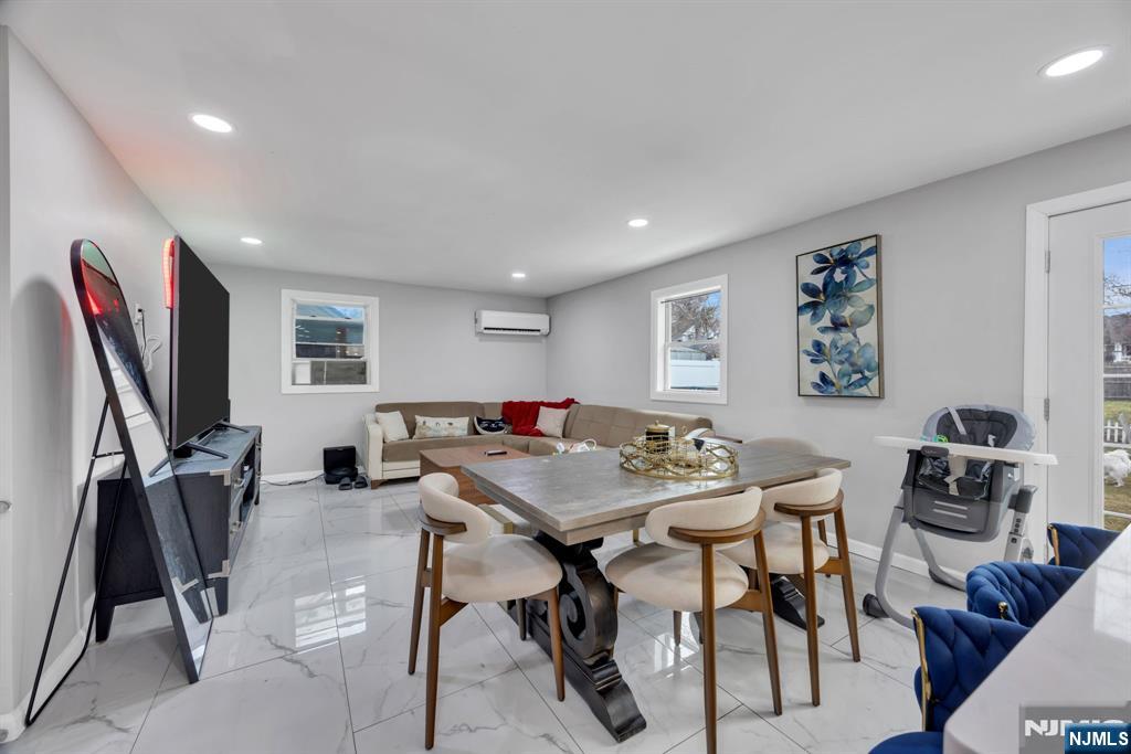 241 Orange Street Dunellen, NJ 08812 - Photo 12 of 35 a view of a dining room with furniture