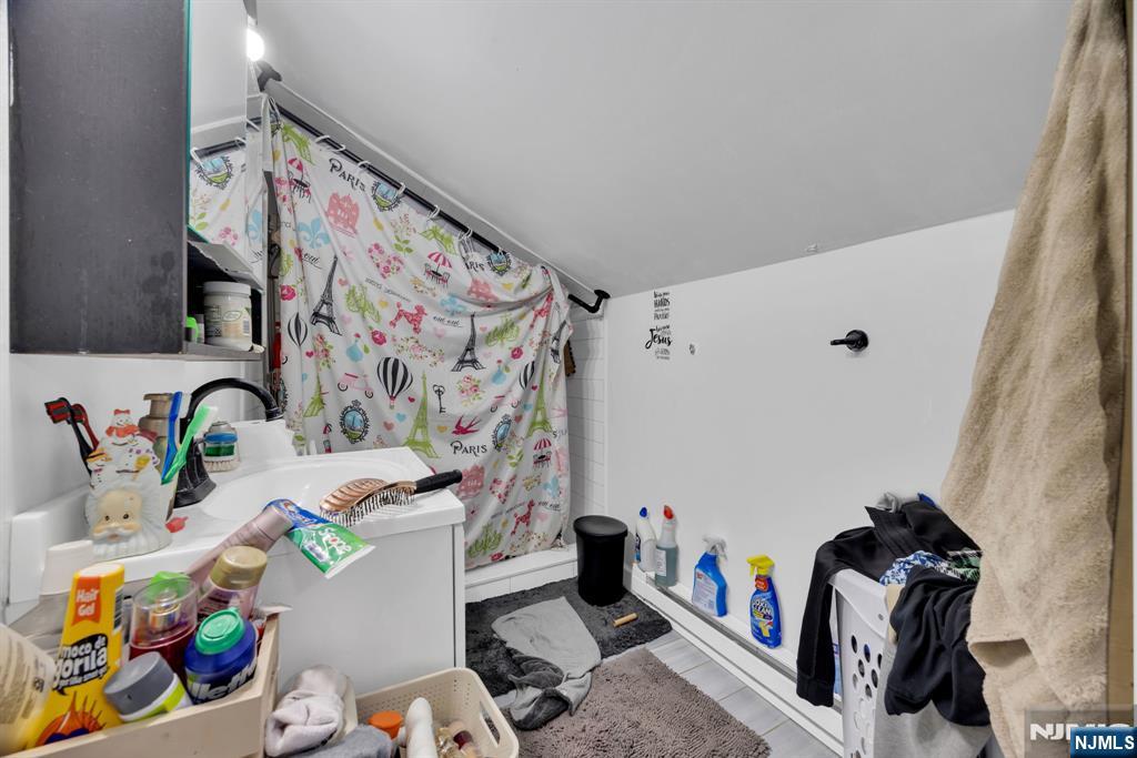 241 Orange Street Dunellen, NJ 08812 - Photo 27 of 35 a room with toys and a wooden floor