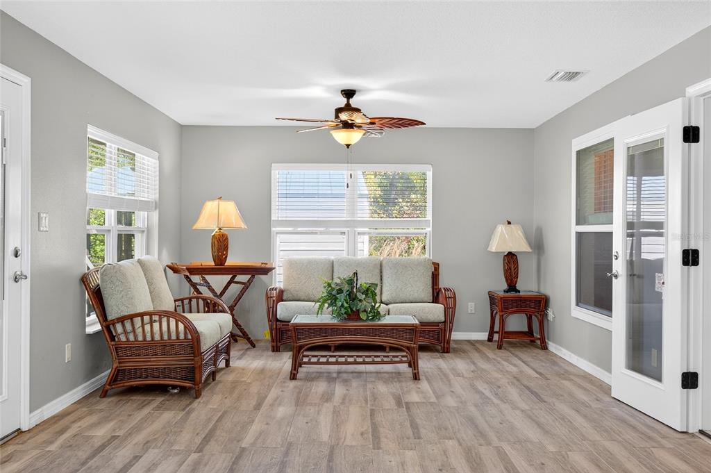 201 West Street Interlachen, FL 32148 - Photo 25 of 43 a living room with furniture and wooden floor