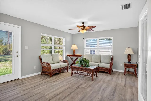 a living room with furniture and a window