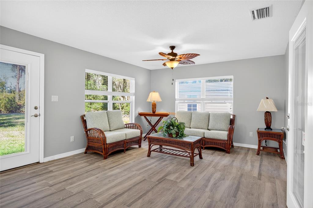 201 West Street Interlachen, FL 32148 - Photo 37 of 43 a living room with furniture and a window