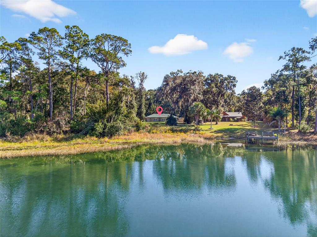201 West Street Interlachen, FL 32148 - Photo 41 of 43 a view of a lake with houses