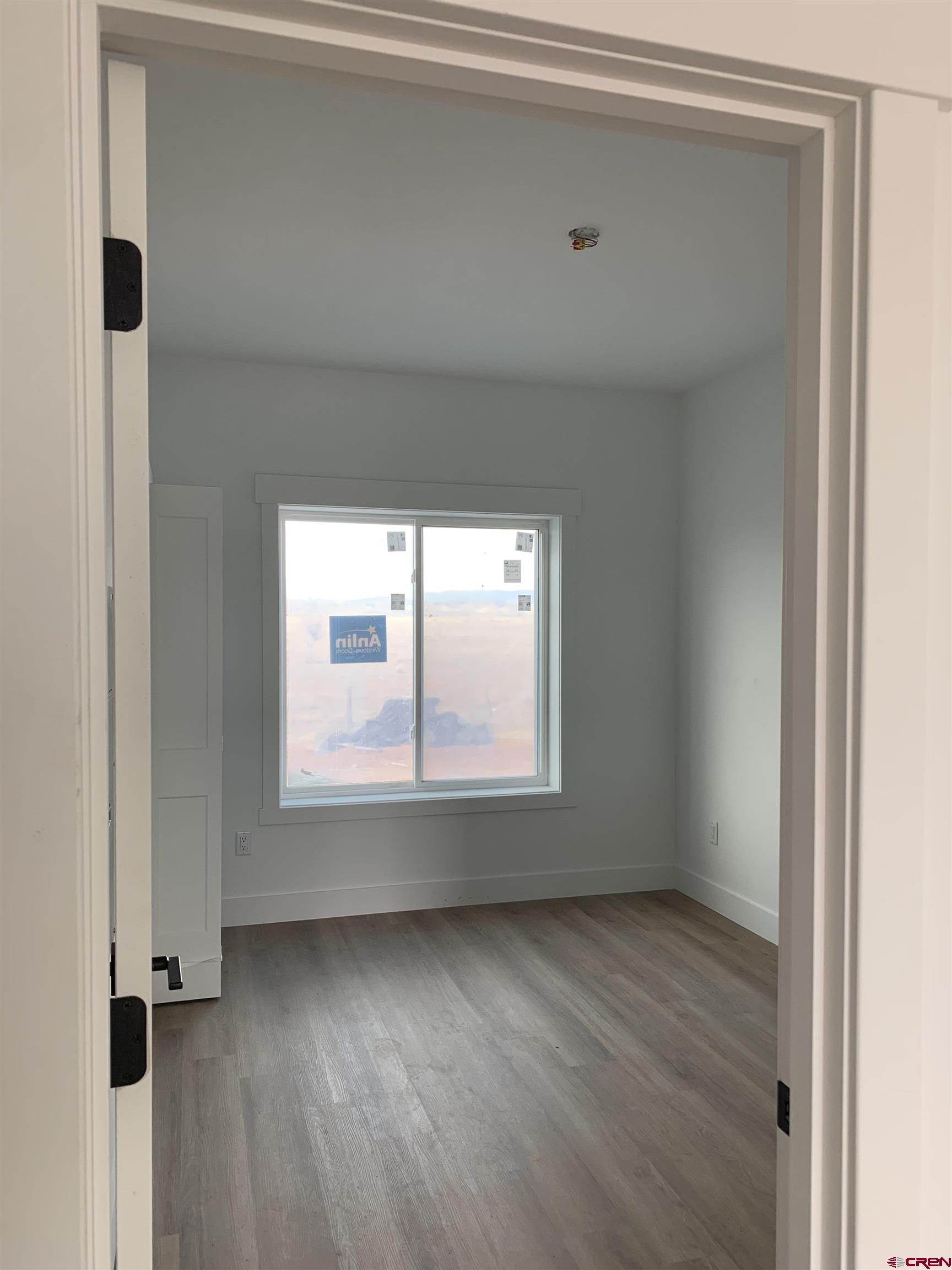 250 Manzano Circle Ignacio, CO 81137 - Photo 10 of 12 an empty room with a window