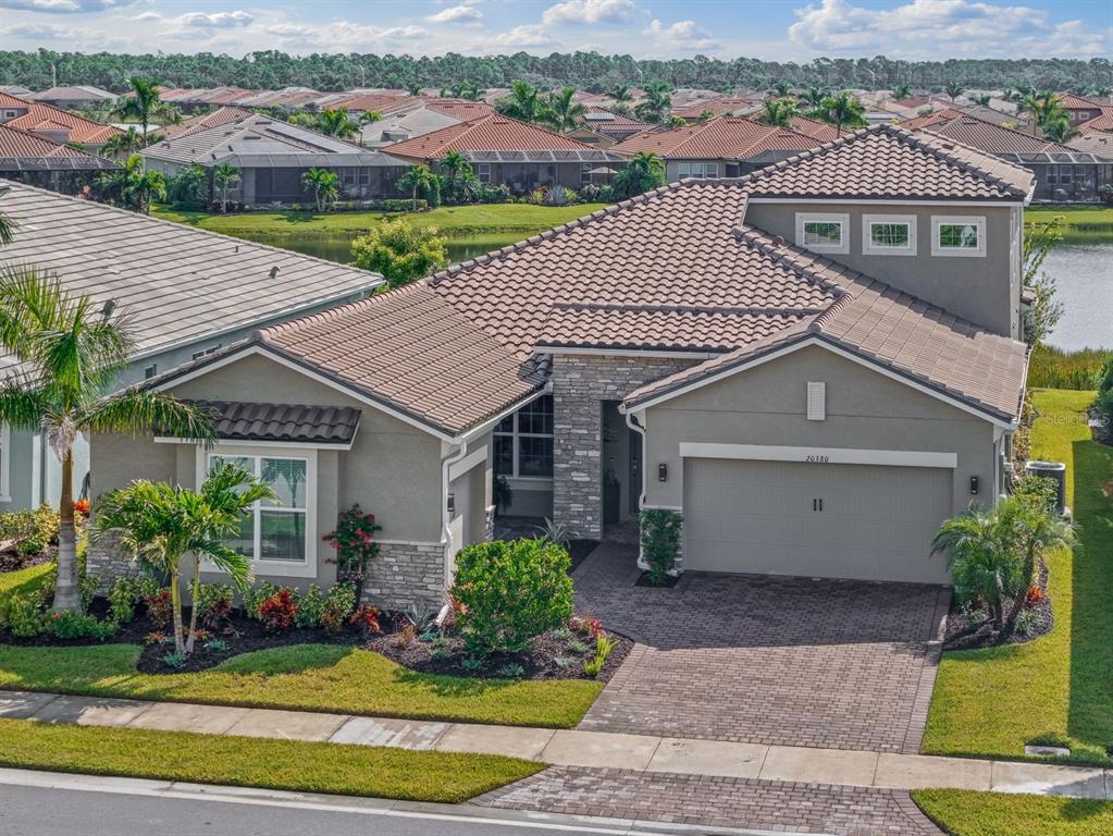 a aerial view of a house with a yard