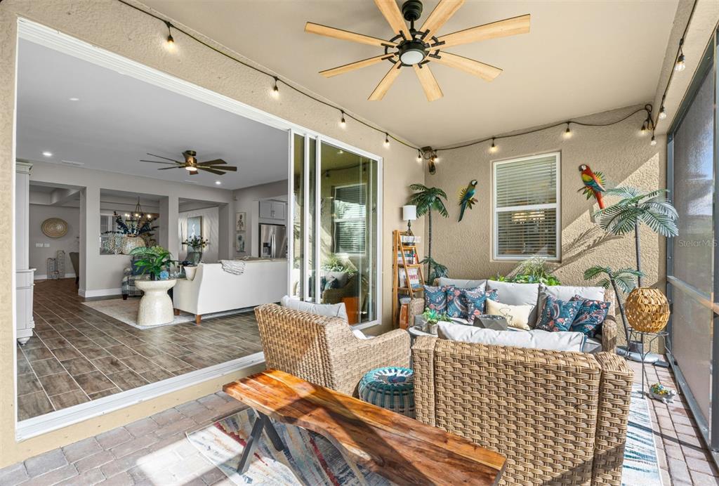 20380 Symphony Place Venice, FL 34293 - Photo 36 of 56 a living room with furniture and a large window