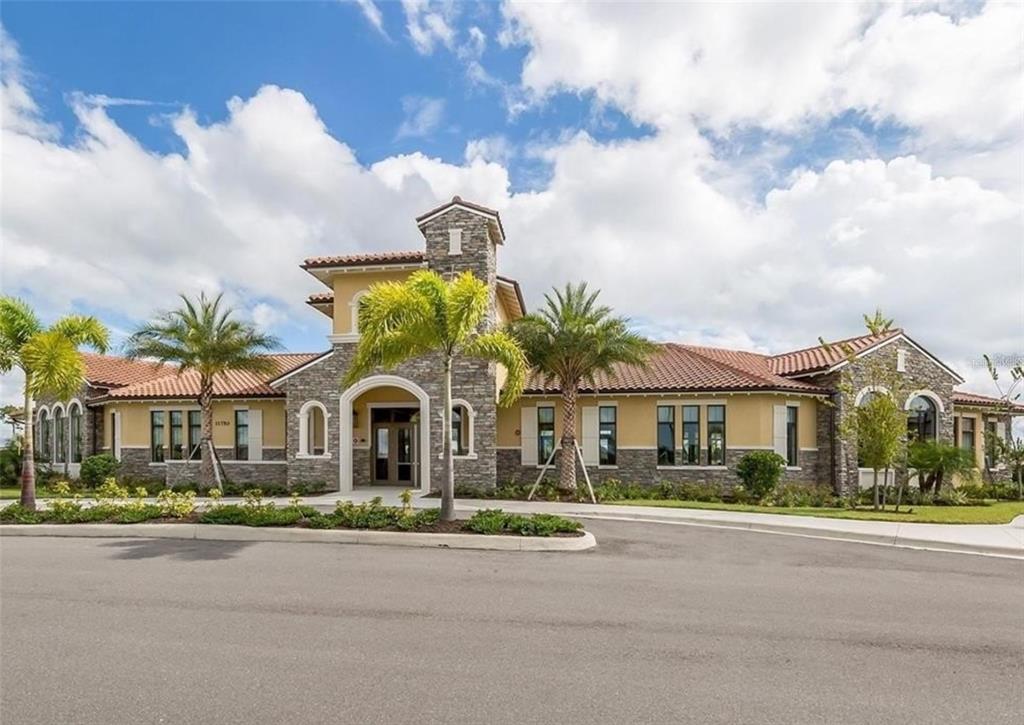 20380 Symphony Place Venice, FL 34293 - Photo 37 of 56 a front view of house with a garden and pathway