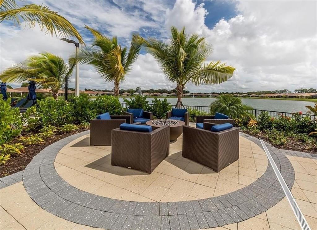 20380 Symphony Place Venice, FL 34293 - Photo 39 of 56 a view of a terrace with a sitting area