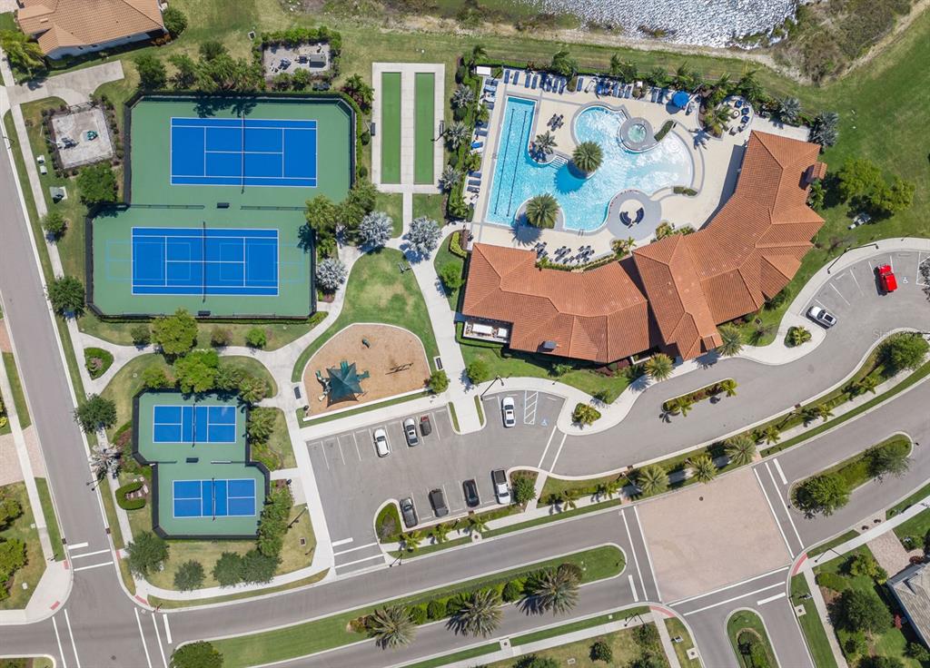 20380 Symphony Place Venice, FL 34293 - Photo 45 of 56 an aerial view of residential houses with outdoor space
