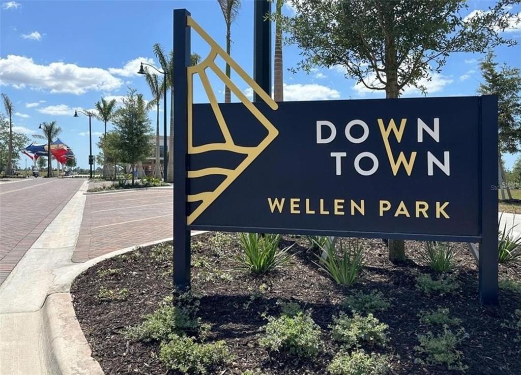 20380 Symphony Place Venice, FL 34293 - Photo 46 of 56 a street sign that is on a pole