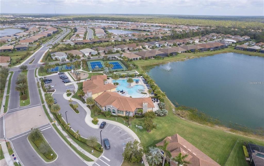 20380 Symphony Place Venice, FL 34293 - Photo 54 of 56 an aerial view of residential houses with outdoor space