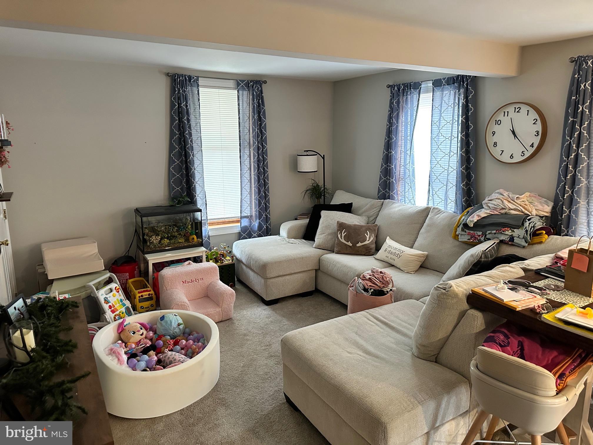 152 North Main Street Chalfont, PA 18914 - Photo 13 of 19 a living room with furniture and a large window