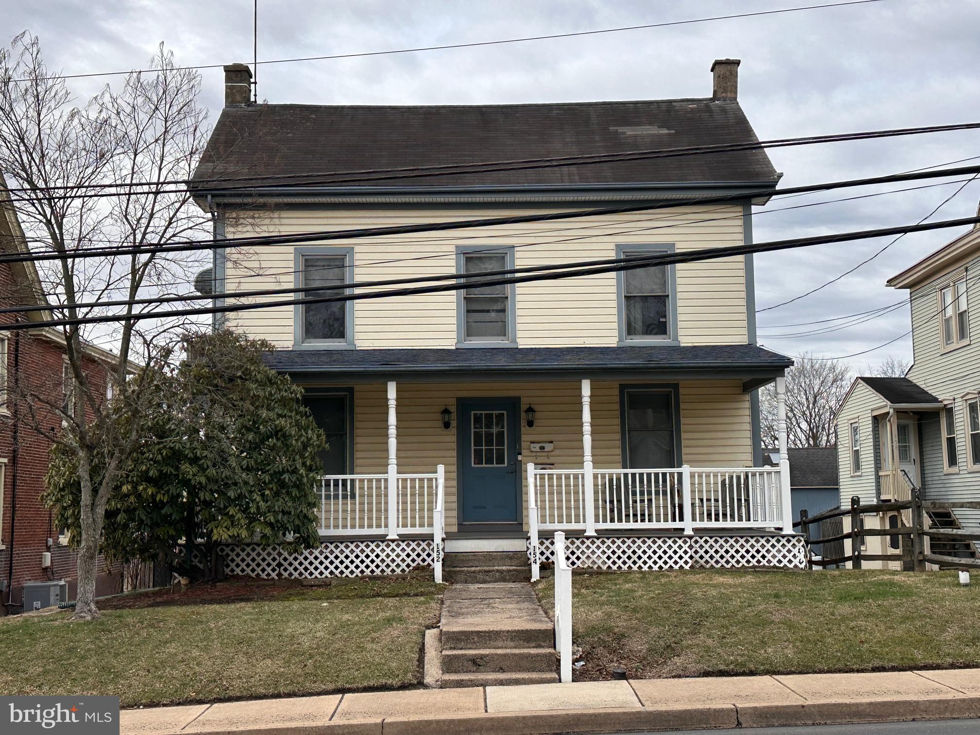 152 North Main Street Chalfont, PA 18914 - Photo 2 of 19 a front view of a house with a garden