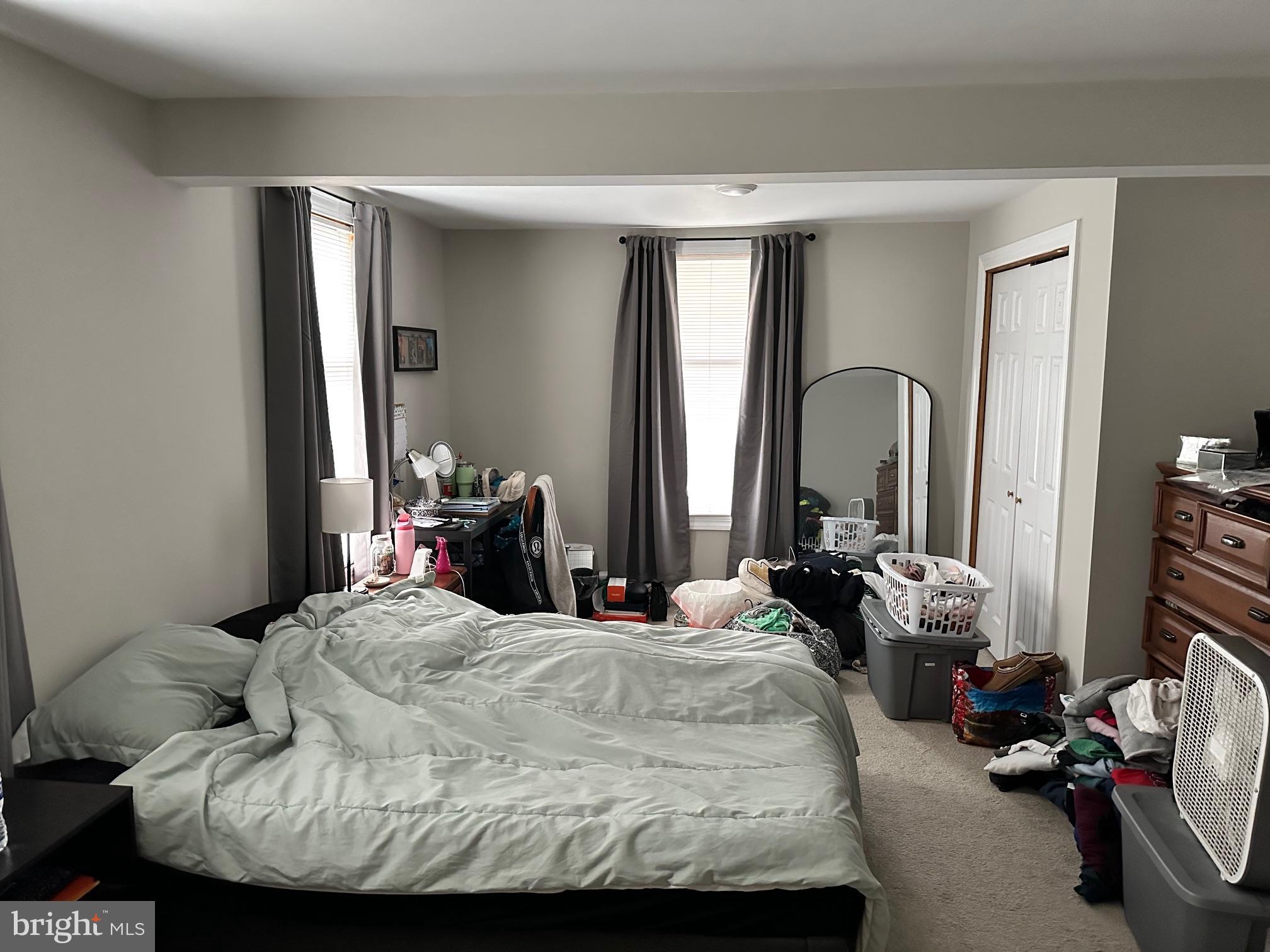 152 North Main Street Chalfont, PA 18914 - Photo 9 of 19 a bedroom with bed and a mirror