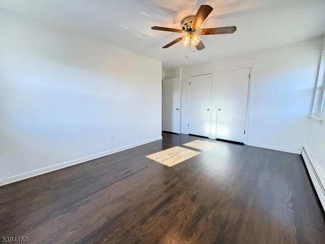 a bathroom with a sink a toilet and bathtub