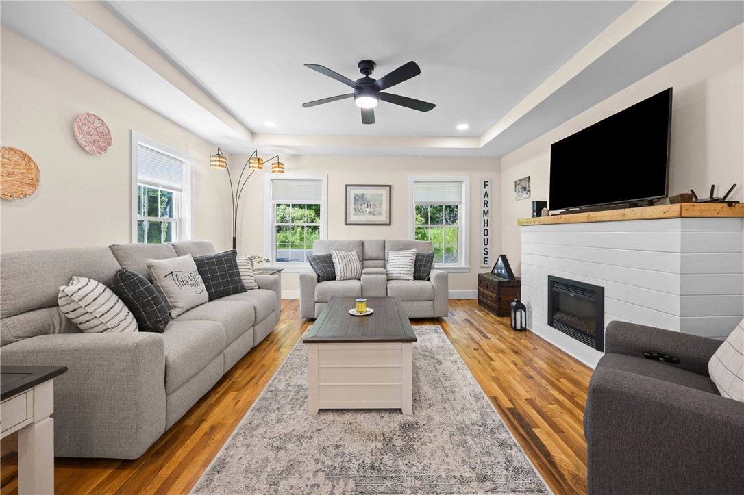4581 Holley Byron Road Holley, NY 14470 - Photo 21 of 50 Family room with electric fireplace