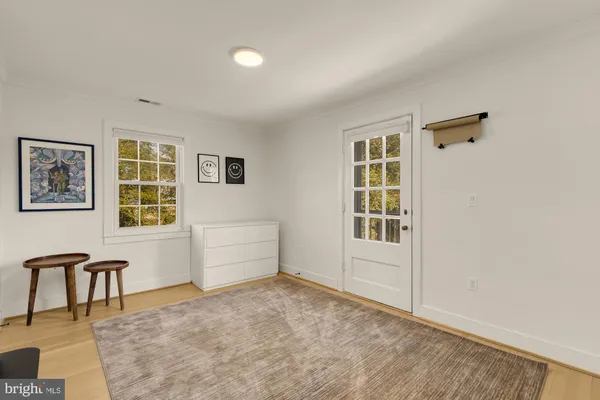 a living room with furniture and windows