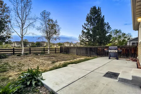 a view of backyard with trees