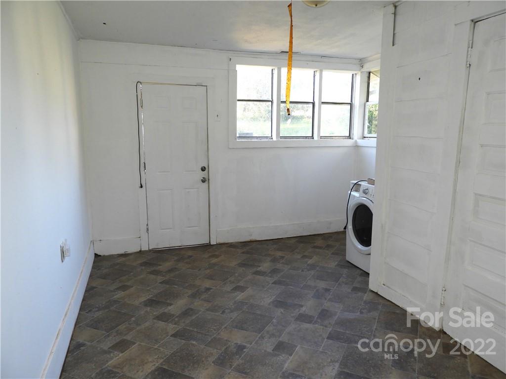 529 Jacktown Road Marion, NC 28752 - Photo 13 of 14 a view of a bathroom with a window