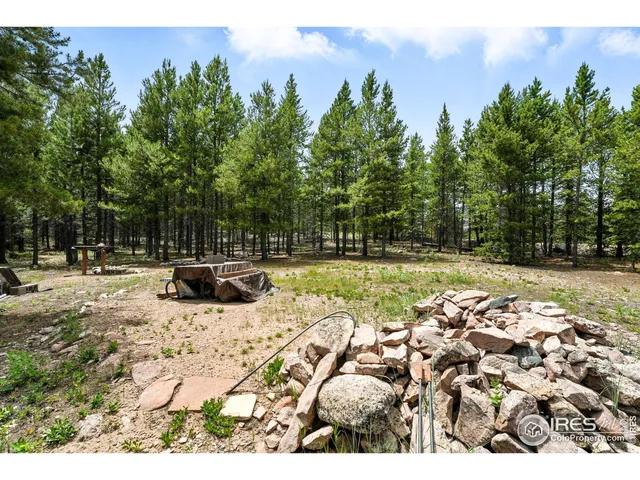 a view of swimming pool with patio