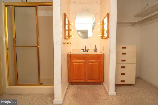 a view of walk in closet with window