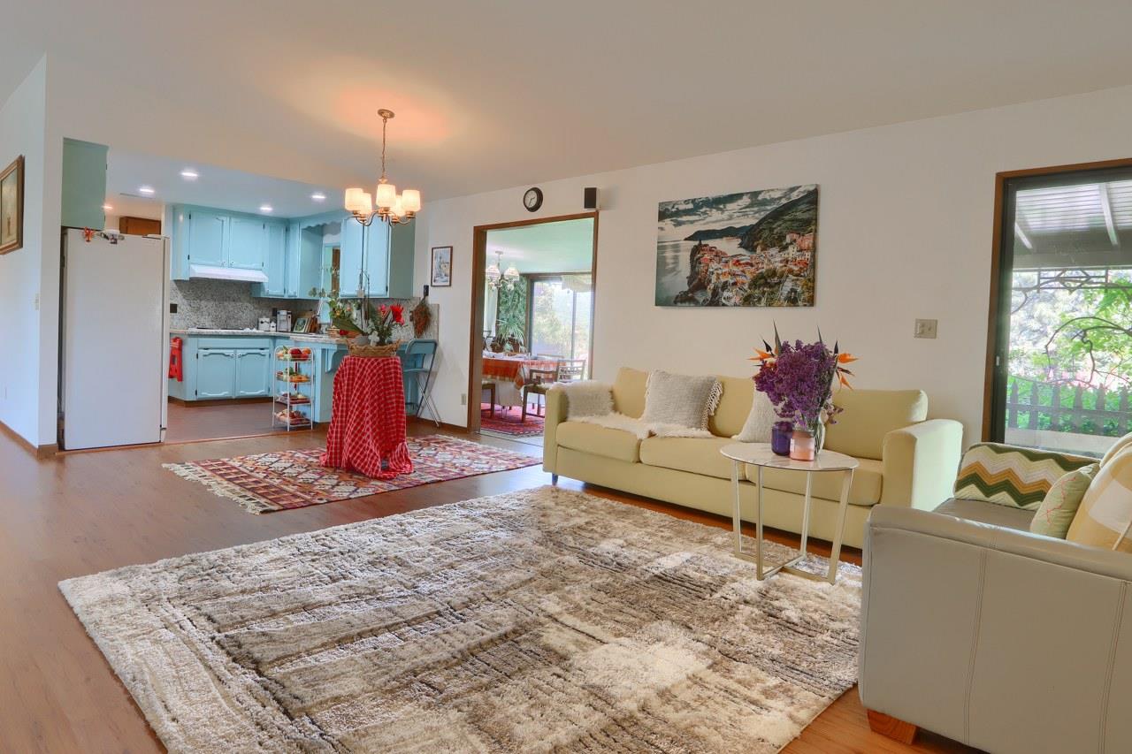 44800 Ahwahnee Acres Road Ahwahnee, CA 93601 - Photo 11 of 77 a living room with furniture and a wooden floor