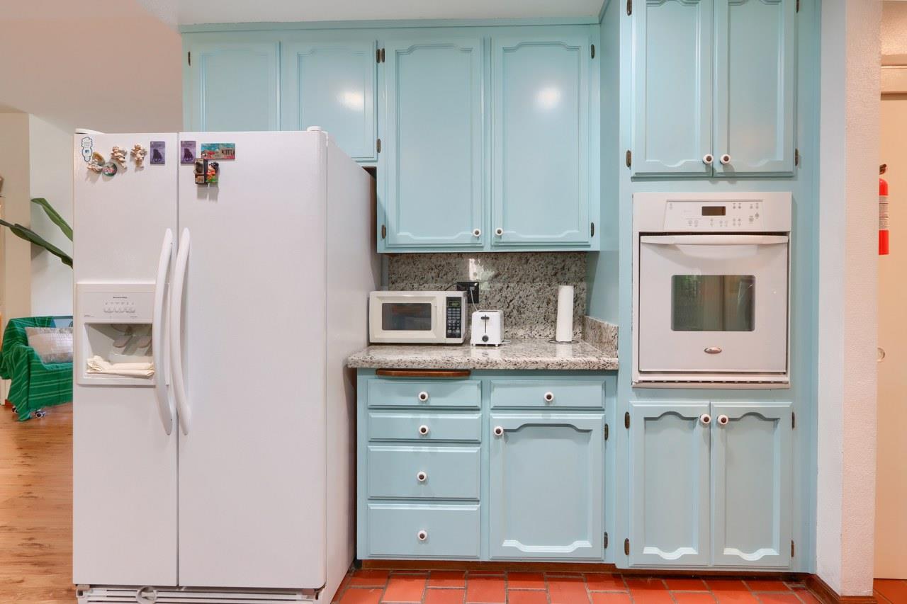 44800 Ahwahnee Acres Road Ahwahnee, CA 93601 - Photo 14 of 77 a white refrigerator freezer sitting inside of a kitchen