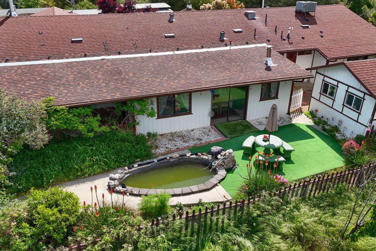 44800 Ahwahnee Acres Road Ahwahnee, CA 93601 - Photo 3 of 77 an aerial view of a house with a garden and lake view