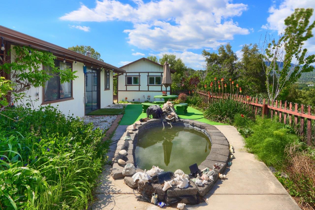 44800 Ahwahnee Acres Road Ahwahnee, CA 93601 - Photo 35 of 77 a front view of a house with a yard