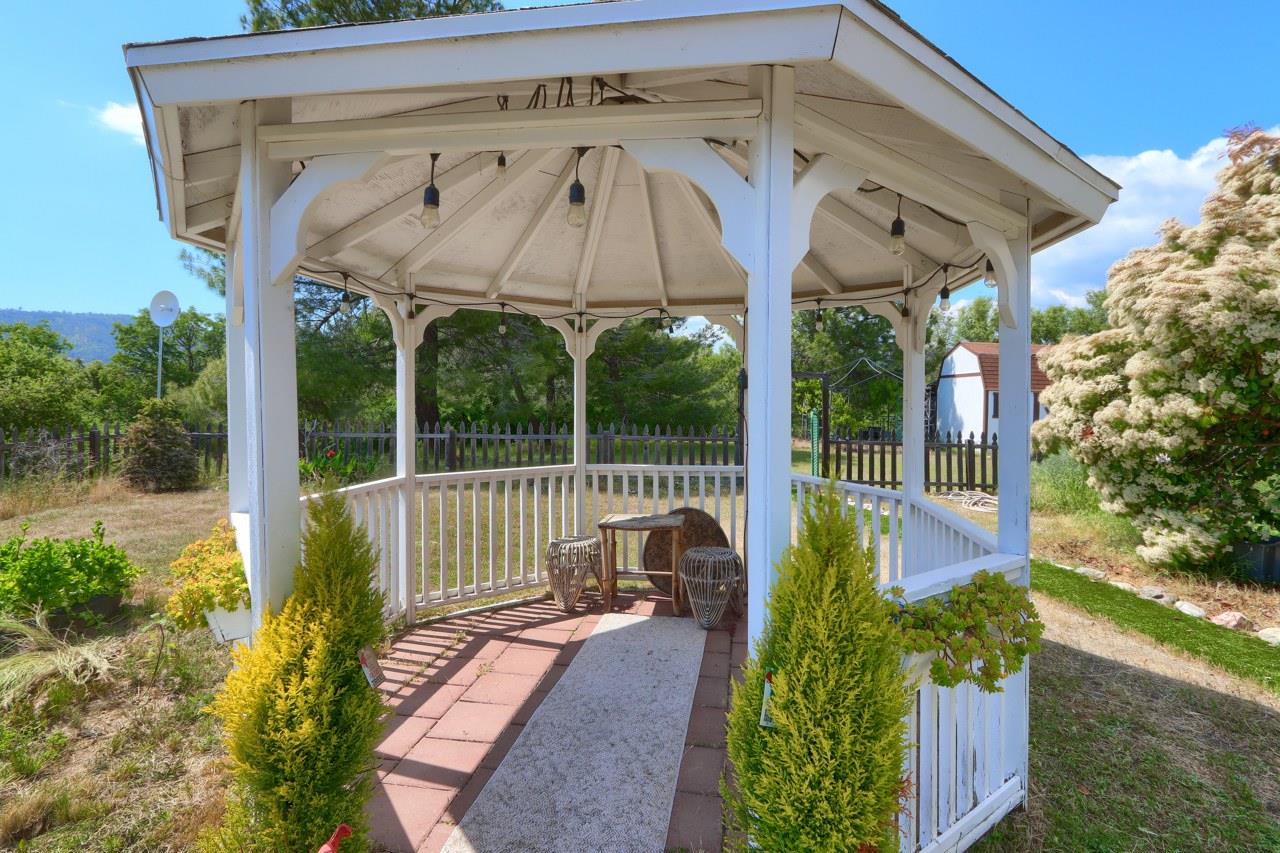 44800 Ahwahnee Acres Road Ahwahnee, CA 93601 - Photo 52 of 77 a view of a wooden deck with a backyard