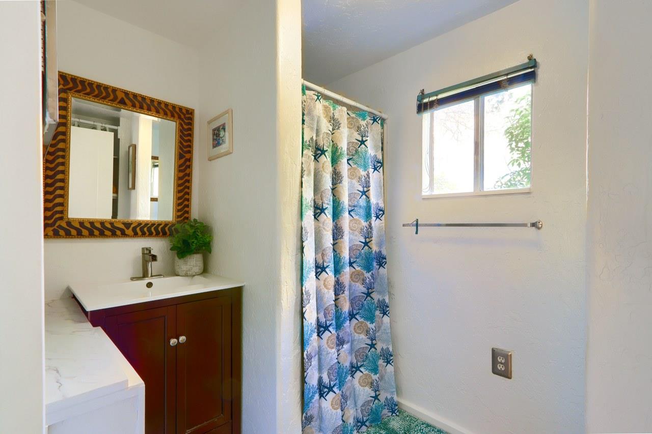 44800 Ahwahnee Acres Road Ahwahnee, CA 93601 - Photo 58 of 77 a bathroom with a sink and a mirror