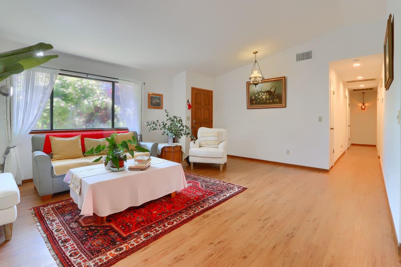 44800 Ahwahnee Acres Road Ahwahnee, CA 93601 - Photo 7 of 77 a living room with furniture and a potted plant