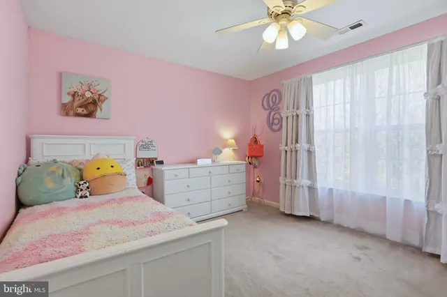 a room with furniture and a window