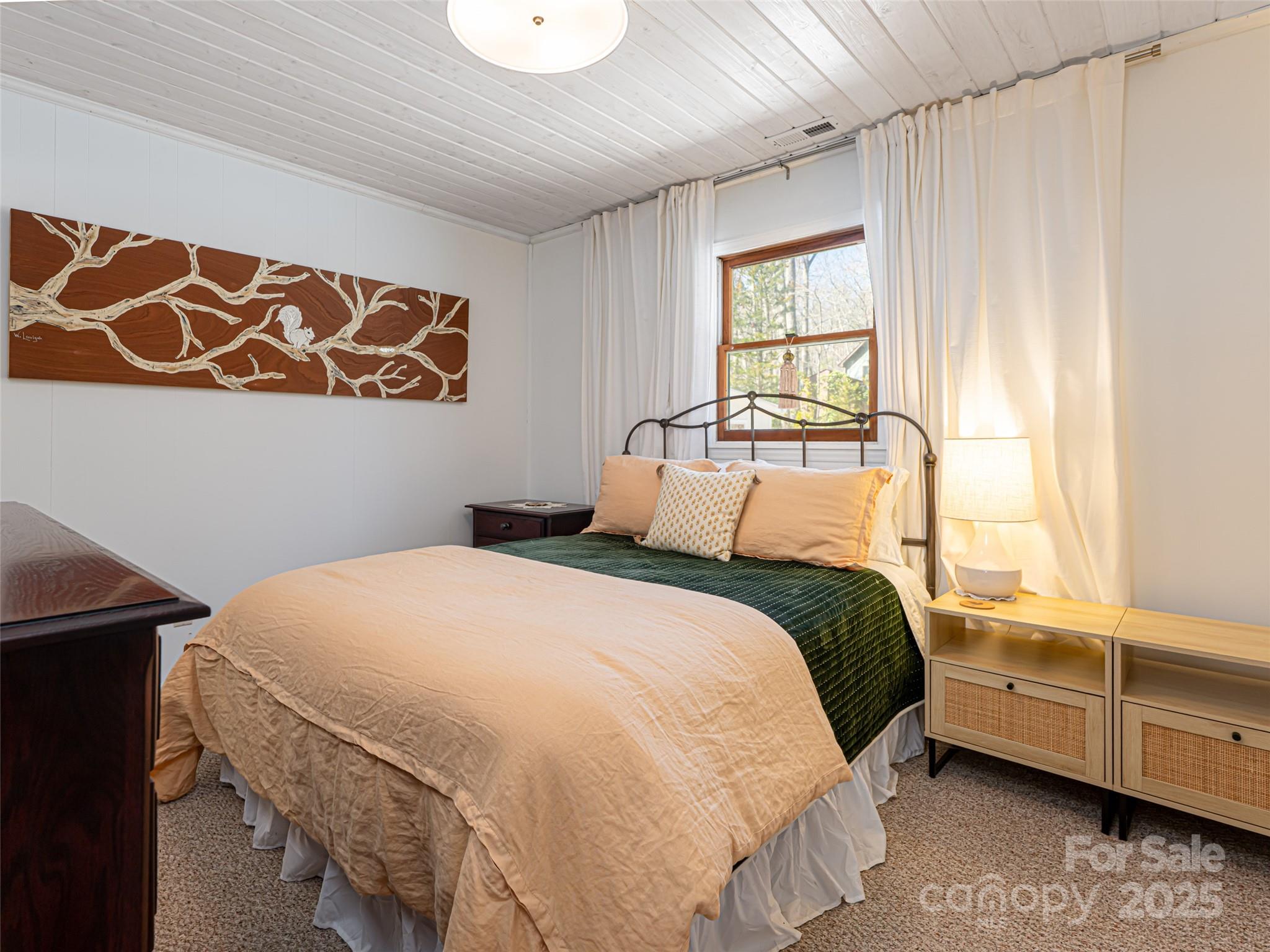 75 Deep Woods Road Mills River, NC 28759 - Photo 16 of 48 a bedroom with a bed and window