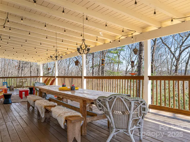 a view of balcony with furniture