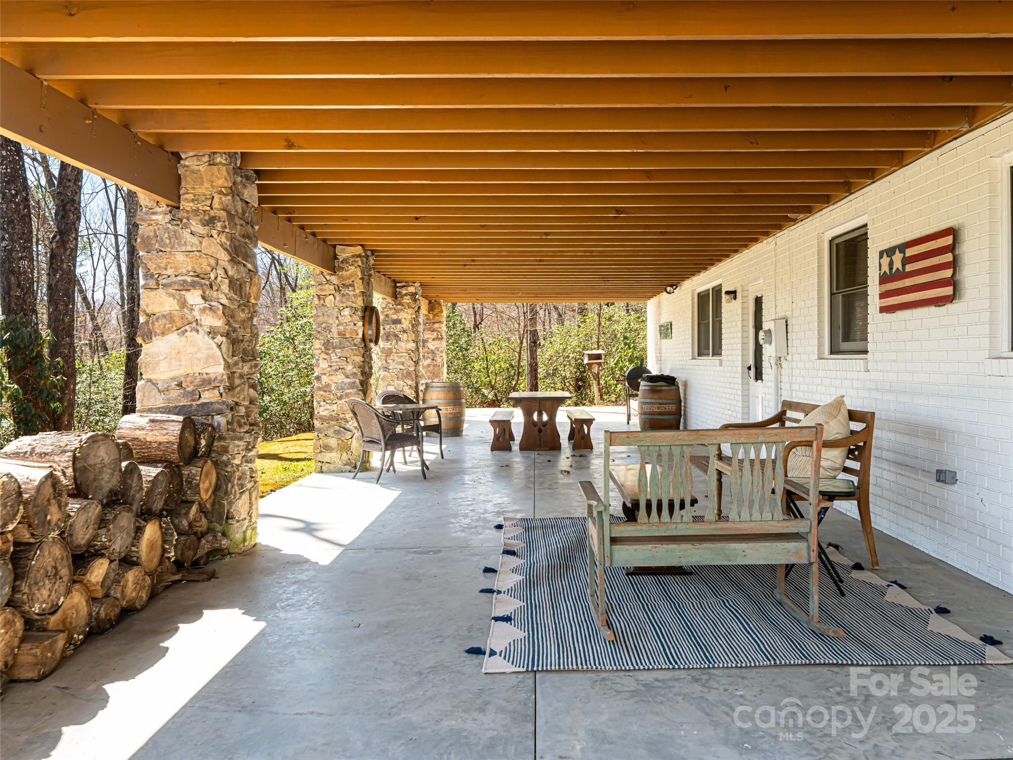 75 Deep Woods Road Mills River, NC 28759 - Photo 40 of 48 a roof deck with couch and chairs