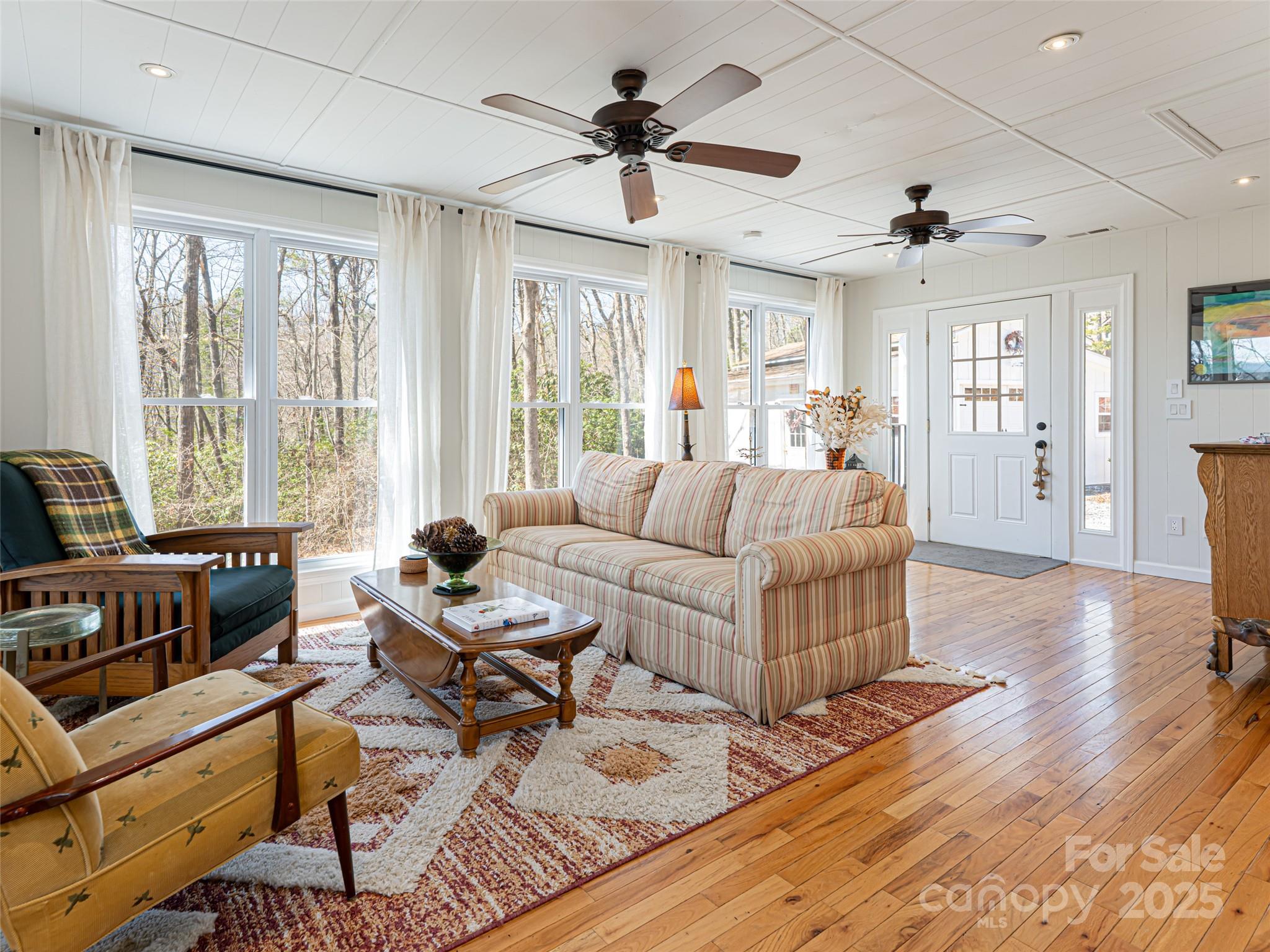 75 Deep Woods Road Mills River, NC 28759 - Photo 9 of 48 a living room with furniture and a large window