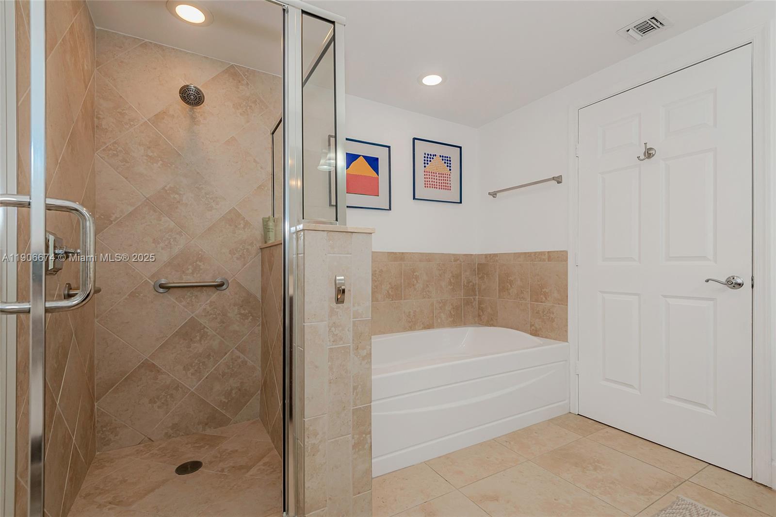 100 Andalusia Avenue, Unit 210 Coral Gables, FL 33134 - Photo 23 of 29 a bathroom with a bathtub and shower