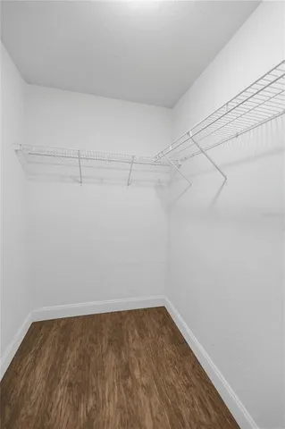 a view of a room with racks on the wall