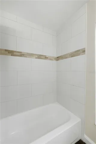 a close up of a bathtub in a bathroom