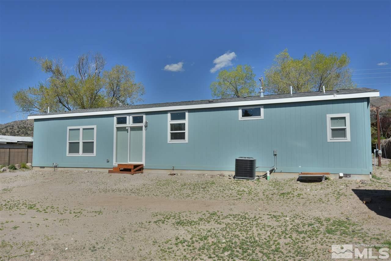 15355 Kivett Lane Reno, NV 89521 - Photo 5 of 15 a front view of a house with a yard